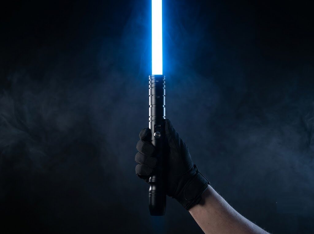 An ignited combat-rated LED training saber