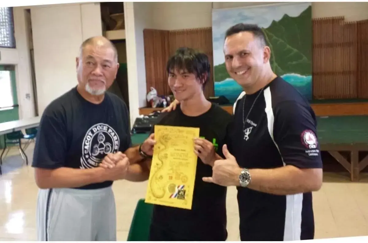 Sijo Nathan Young receiving his Danzan Ryu Jujitsu rank under Professor Kai Li